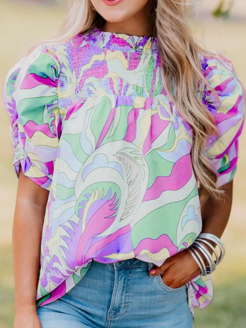 Women’s smocked round neck short sleeve blouse